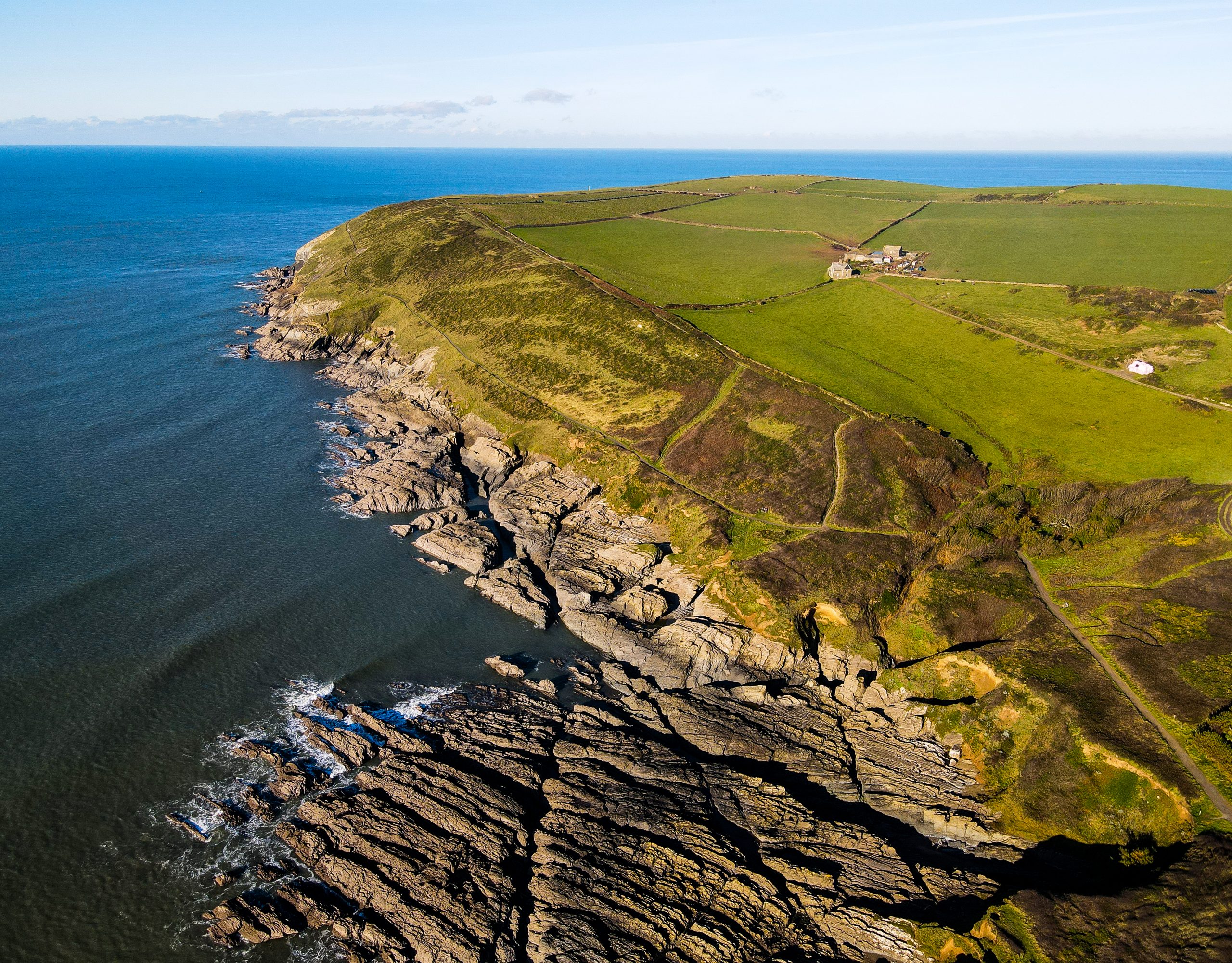 arial view of baggy point national trust headland croyde